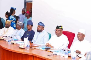 L-R:  Honourable Gaza Gbefwi, House Committee Chairman on Solid Minerals (middle); Senator Ekong Sampson, Senate Committee Chairman on Solid Minerals and other joint National Assembly Committee Members during the debate on the budget defense session on mining sector at the National Assembly on Friday.